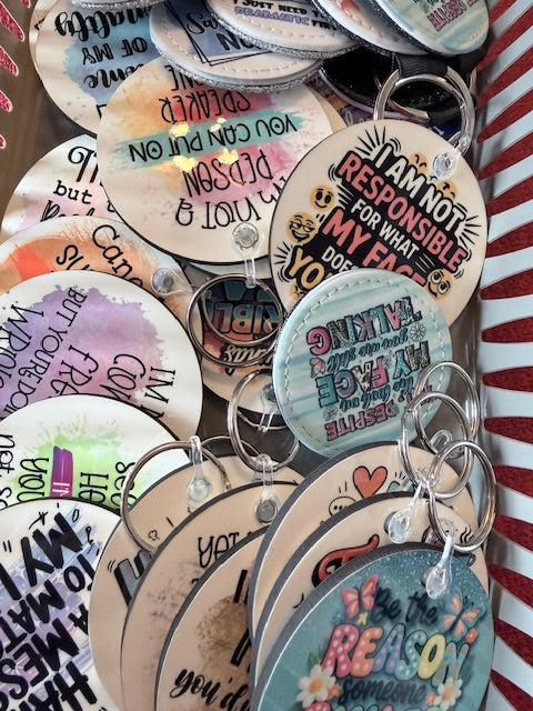 LIVE CLAIM KEYCHAINS